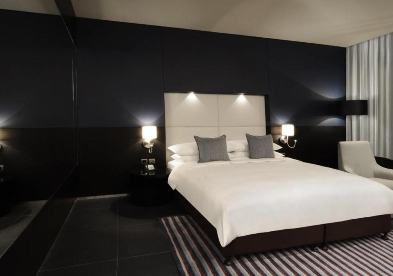 더 블러바드 아르잔 바이 로타나 암만 외부 사진 A bedroom at the hotel