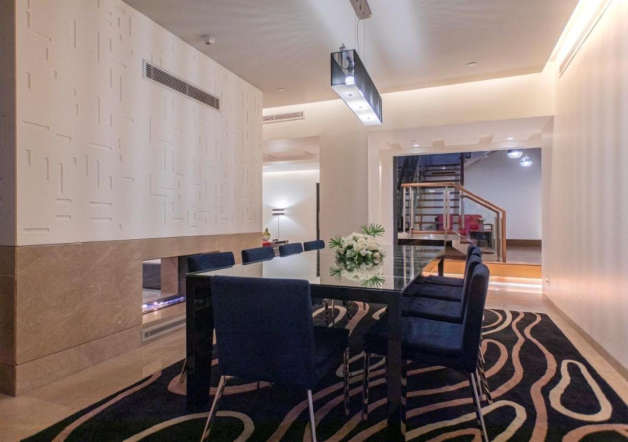 더 블러바드 아르잔 바이 로타나 암만 외부 사진 A modern dining room